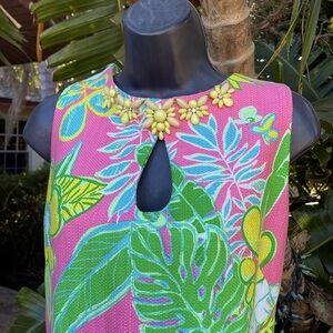 Taylor floral 60s retro print, with beaded neckline and peekaboo front